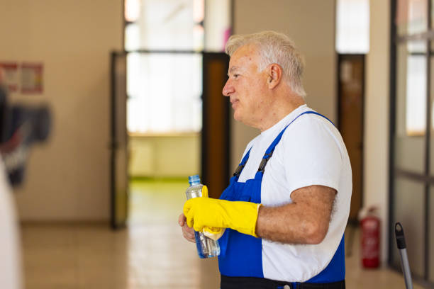 istock Senior male Caucasian janitor taking a break from the work 2161322570
