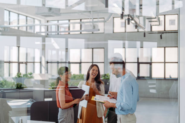 istock Coworkers brainstorming in the office 2161326602