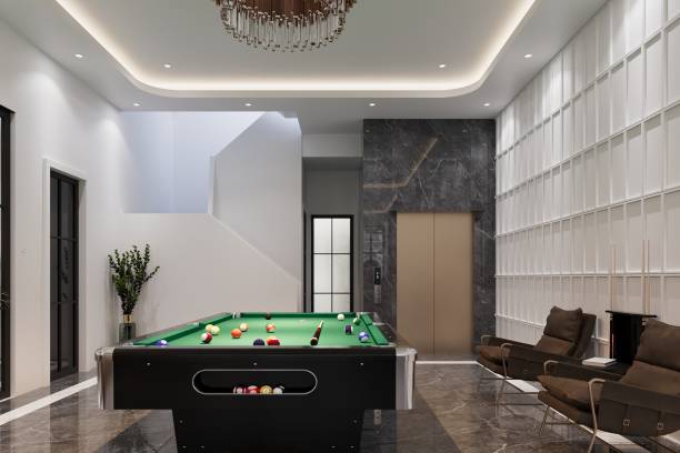 istock A billiard table is placed with an armchair in the lobby, interior design 2161329106