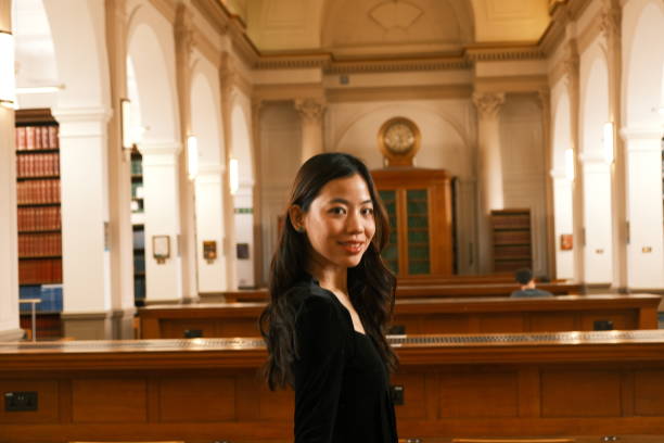 istock Girl in a Library University 2161331520