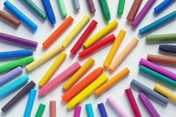 istock Different colorful oil pastel crayons on white paper 2161332847