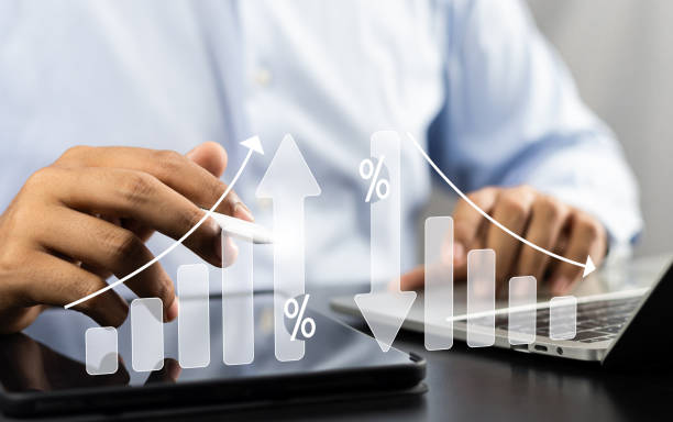 istock Business strategy success Cost and quality control for effective management Achieving goals, Businessman analyzing growth graph and cost reduction, Success business growth for long-term investments. 2161335359
