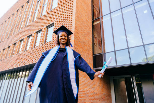 istock Education, graduation and people concept. 2161337380