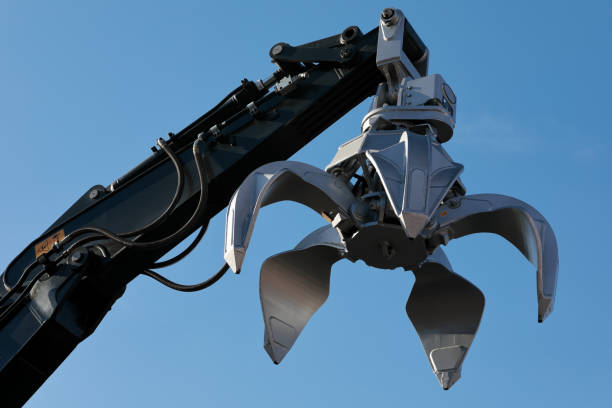 istock excavator arm with metal scrap grabber 2161341554