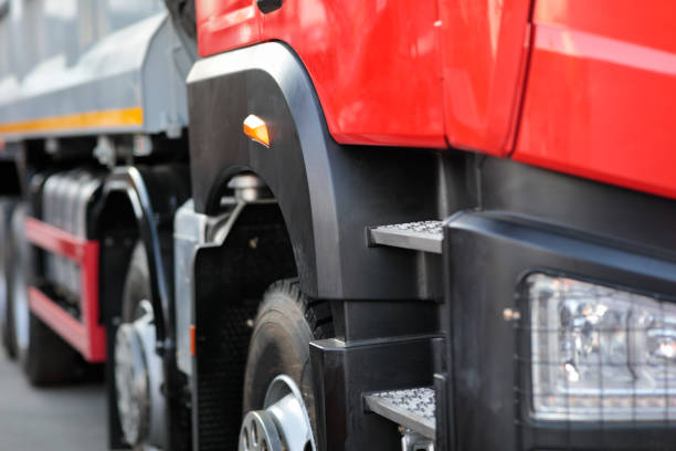 istock close-up side view of a four axle dump truck 2161342076