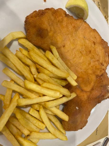 istock Schnitzel with fries 2161342215