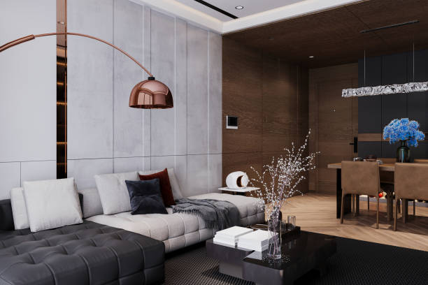 istock A classy modular sofa and coffee table sit on the black carpet in a moody modern living. 2161342526