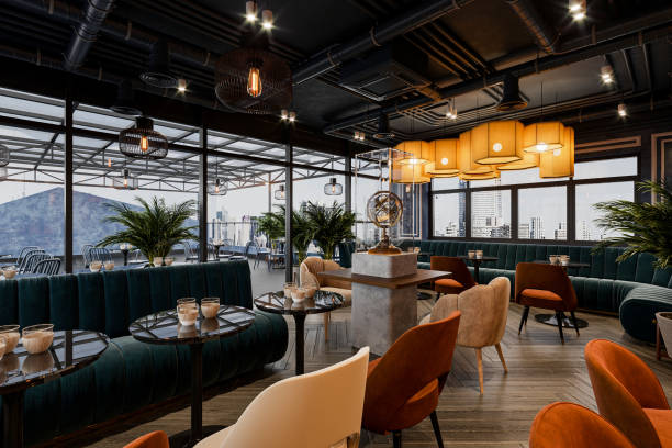 istock The restaurant features tables and chairs, lighting, and a city view from a loft space. 2161343379