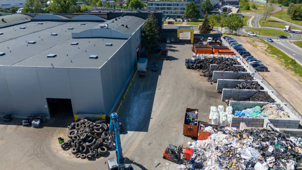 istock Drone photography of recycling center and machinery sorting material during summer day 2161344607