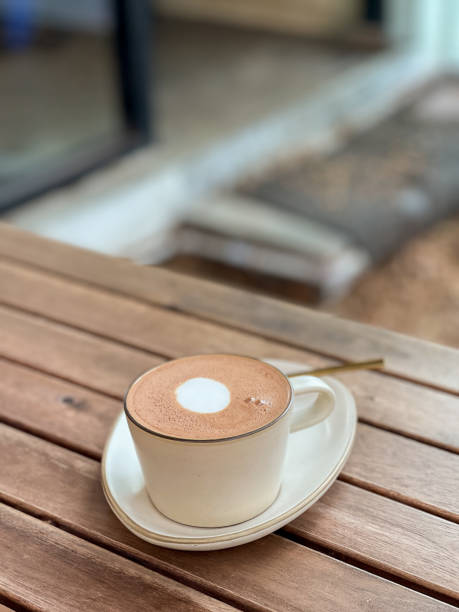 A cup of hot chocolate on wooden table