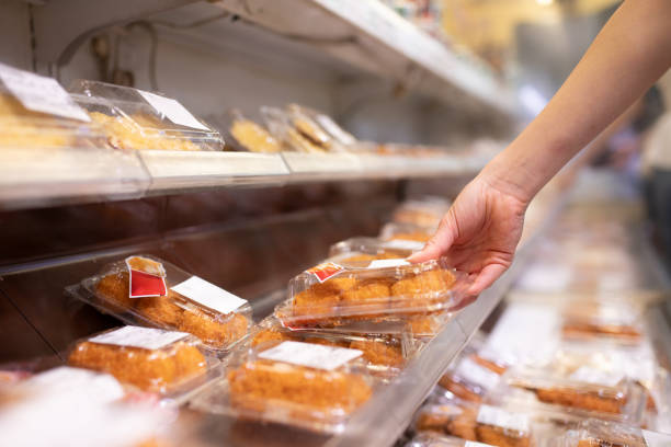 Woman's hand choosing croquette
