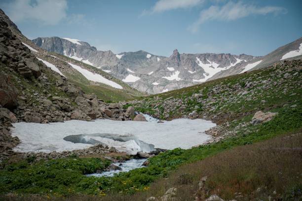 istock hiking to mountain in spring time 2161359197