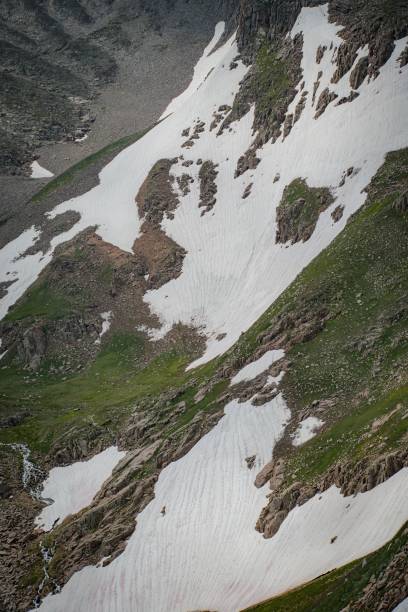 istock hiking to mountain in spring time 2161359676