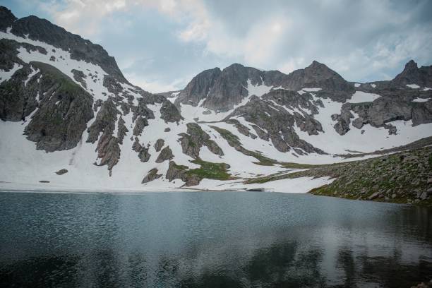 istock hiking to mountain in spring time 2161359875