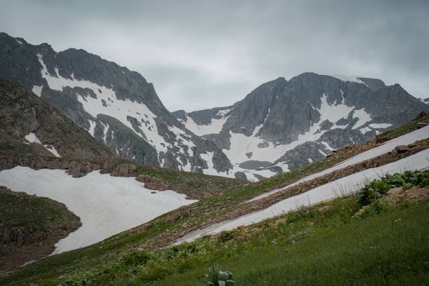istock hiking to mountain in spring time 2161360251