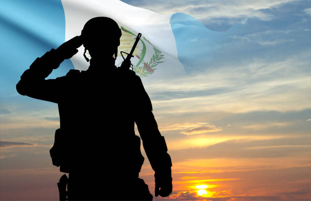 istock Silhouette of soldier with Guatemala flag 2161362011