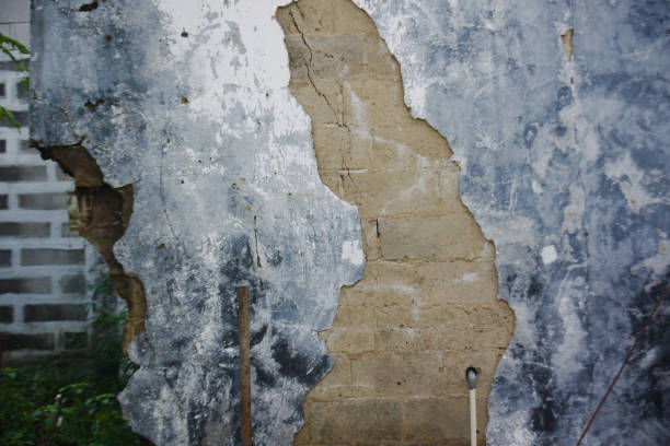 istock Abstract background of cracked and peeling walls 2161364594