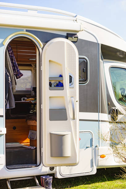 istock Camper door with trash can. 2161366853