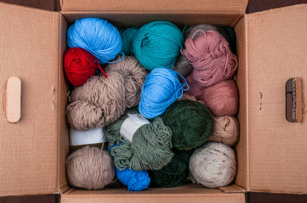Balls of wool in a carton