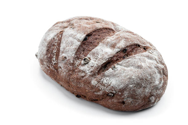 istock Rye whole grain bread with raisins isolated on white 2161370917