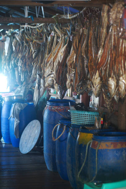 istock Dried fish on a hanging in a shop. 2161374517