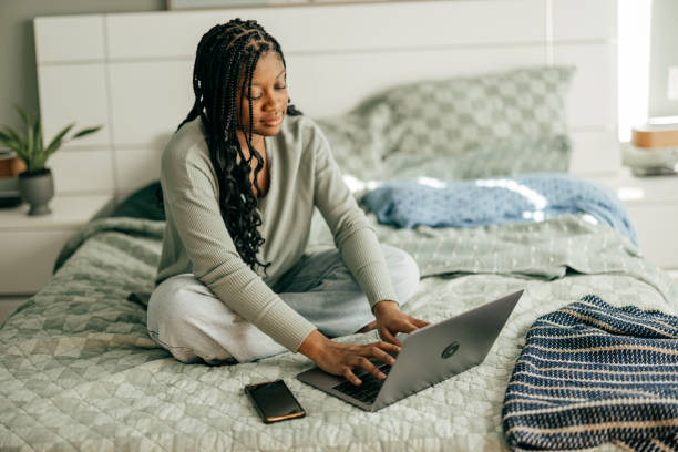 istock A teen using digital overlays to compare different saving strategies 2161375575