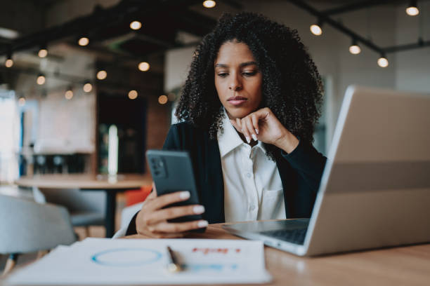 istock Young businesswoman using smartphone 2161387290