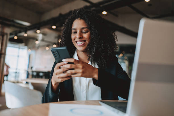 istock Young businesswoman using smartphone 2161387327