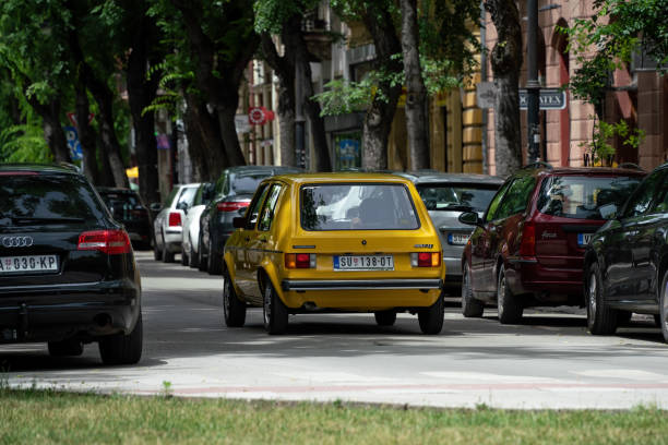Yellow Volkswagen Golf 1 J GL (3 door, J - Jugoslavia, TAS plant, Sarajevo) in excellent condition is griving in Subotica, Serbia, 09.06.2024