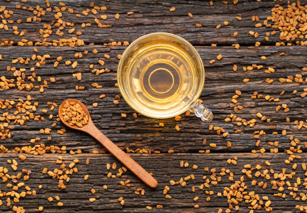 istock Trigonella foenum - graecum - Hot tea from aromatic and organic fenugreek seeds 2161396576