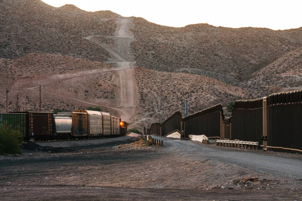 istock Freight Train Transporting goods along the USA / Mexico border 2161398605
