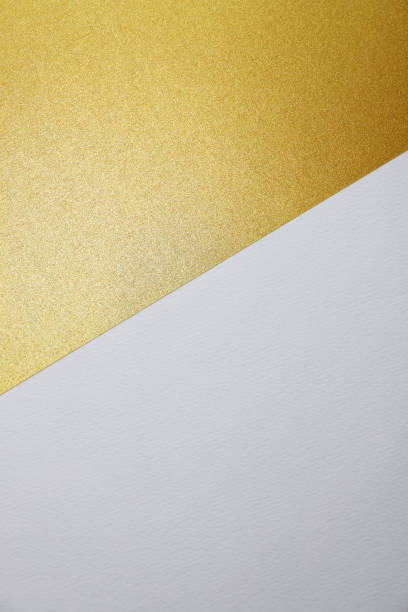 istock White and gold paper background with copy space for text or image. 2161398996