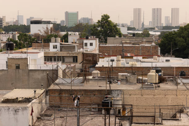 Urban Core of downtown Guadalajara Jalisco Mexico Morning view of dense urban housing and skyline of downtown Guadalajara, Jalisco, Mexico. poverty mexico environment slum stock pictures, royalty-free photos & images
