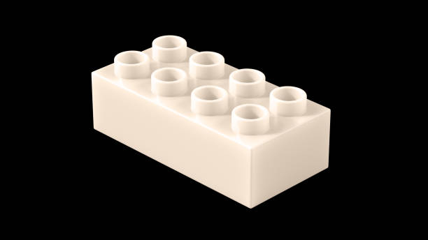istock Ivory Plastic Toy Block Isolated on a Black Background. 2161400706