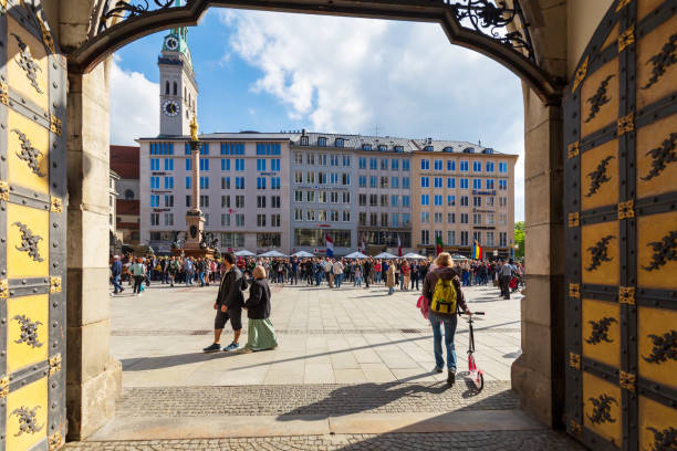 Munich, Germany - May 09, 2024: Tourists Capturing Munich Rathaus Glockenspiel