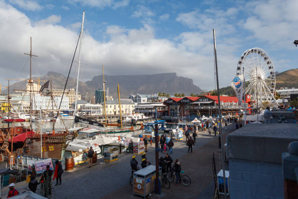 The marina with its boats, historic buildings and Table Mountain in Cape Town, South Africa.