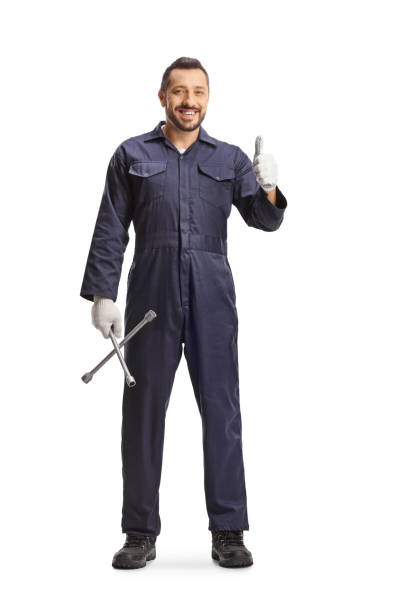 istock Car mechanic holding a wrench and gesturing thumbs up 2161406607