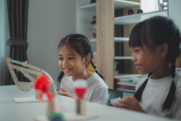 istock STEM education concept. Asian students learn at home with STEM toys, mathematics engineering science technology computer code in robotics for kids' concepts. 2161410822