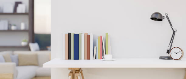 istock A white tabletop against the white wall in a room with accessories. home workspace 2161411117