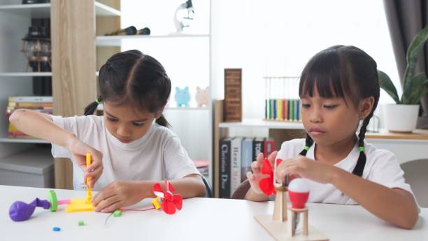 istock STEM education concept. Asian students learn at home with STEM toys, mathematics engineering science technology computer code in robotics for kids' concepts. 2161411947