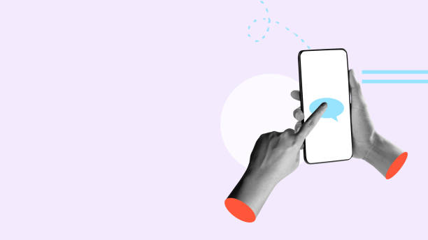 istock Human hand holding mobile phones with a speech bubble 2161414593