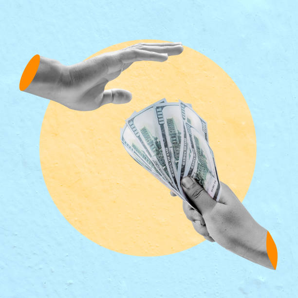 istock The human hand refuses to accept dollar bills 2161414782