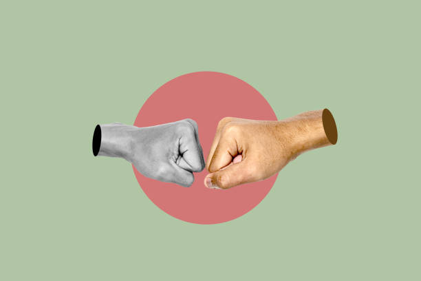 istock Two hands giving fist bumps together in a circle 2161414800