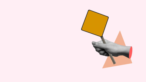 istock Woman hand holding empty square speech bubble over pastel background 2161414846