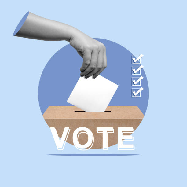 istock A human hand puts a ballot into a ballot box 2161414938