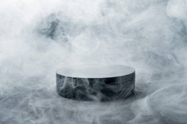 istock Minimal black round podium surrounded by fog creating mysterious atmosphere 2161416504