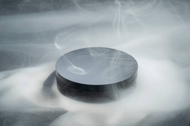 Enveloped in swirling smoke, a round platform creates a mysterious and minimalist atmosphere for showcasing products. Dark and gray hues add drama, ideal for modern design concepts