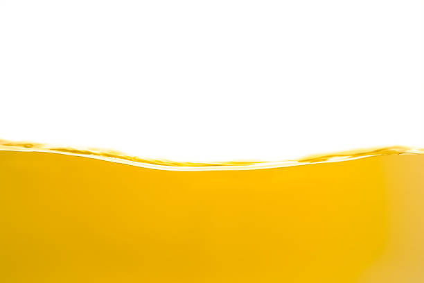 istock Vegetable golden oil splashing and ripple on surface 2161416911