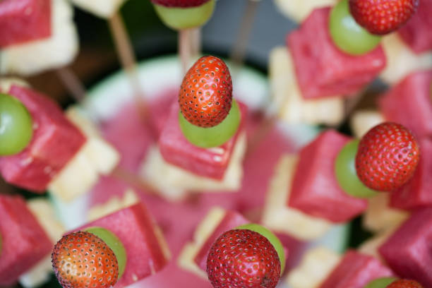 istock colorful fruit skewer 2161418429