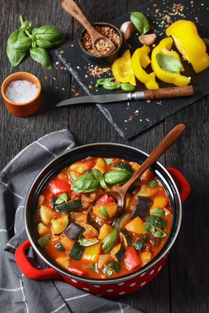 istock hearty italian vegetable stew in red pot, top view 2161423184